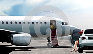 Women in red ready to boarding a private jet