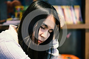 Women relaxing in the library.