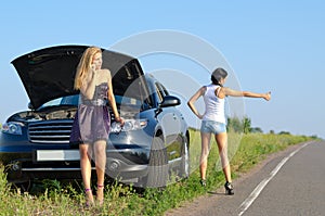 Women with a roadside breakdown