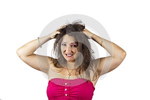 Women ruffling her hair photo