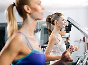 Women running on a treadmill