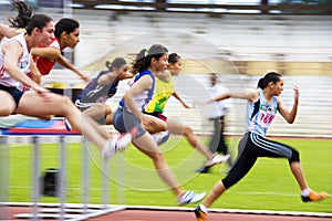Women's 100 Meters Hurdles Action (Blurred)