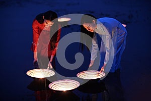 Women`s in Ao dai Vietnam traditional dress are spot lamp in the