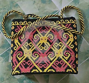 Women& x27;s beaded bags with Dayak motifs are very beautiful and unique from Kalimantan