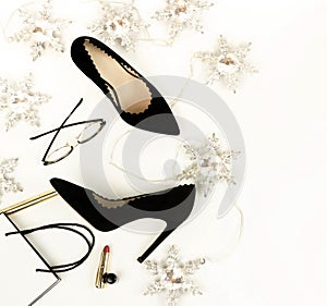 Women`s black high-heeled shoes and accessories