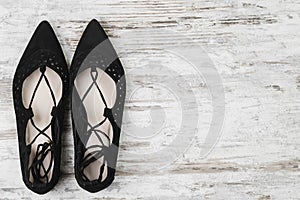 Women`s black shoes flats copy space