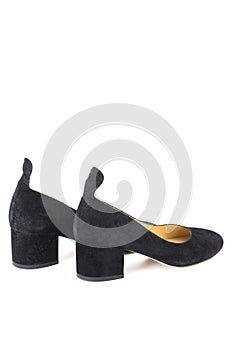 Women`s black shoes with heels on a white background