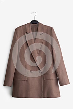 Women`s blazer on a hanger