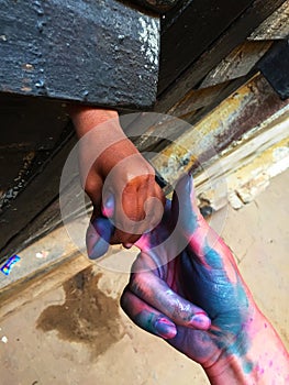 Women`s and child`s hands, woman and child holding hands