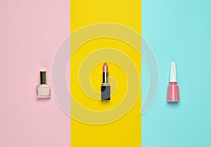 Women& x27;s cosmetics and accessories for beauty care on a colored pastel background. Nail polish, lipstick, top view, minimalist