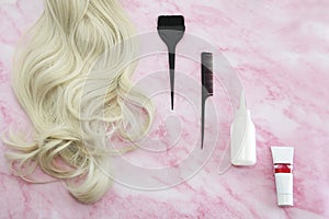 Women`s curls and hair coloring tools
