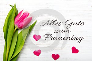 Women`s day card with German words `Alles gute zum frauentag`