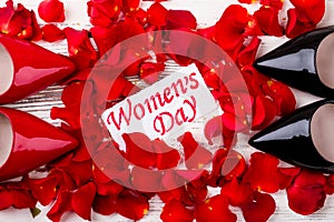 Women`s Day card and petals.