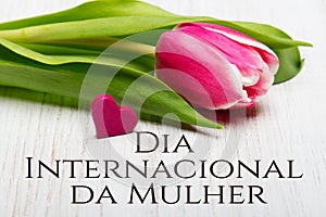 Women`s day card with Portuguese words `DÃ­a Internacional da Mulher`