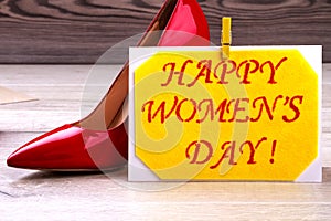 Women`s Day card and shoe.
