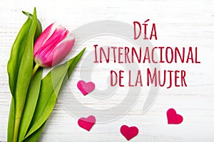 Women`s day card with Spanish words `DÃÂ­a International de la Mujer` photo