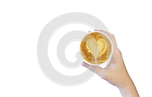 Women`s Hand holding cup of cappuccino coffee with heart shape latte art isolated on white background, Latte coffee on white