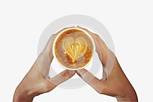 Women`s Hand holding cup of cappuccino coffee with heart shape latte art isolated on white background, Latte coffee on white