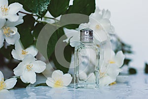 Women`s hand spray perfume. Flower arrangement.