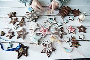 Women's hands and christmas cookies