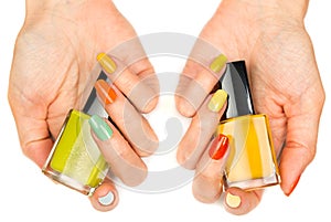 Women's hands with a colored nail varnish