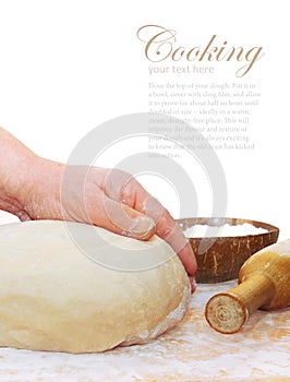 Women's hands knead the dough