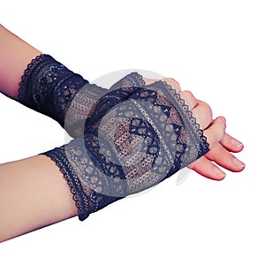 Women's hands in lace gloves closeup, isolated on a white background