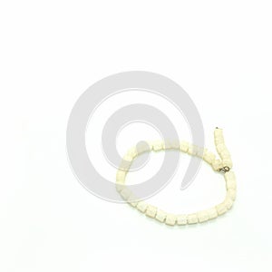 Women`s jewelry: milk-white necklace. Cube-shaped beads
