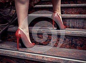 Women`s legs in shoes close-up