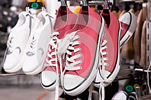 Women`s and men`s shoes. Sneakers close-up