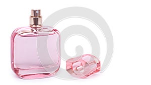 women& x27;s perfume in beautiful pink bottle isolated on white background, luxury smell, crystall glass. copy space, template