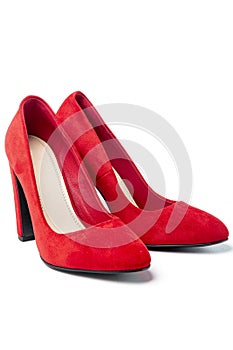 Women`s red high-heeled shoes isolated