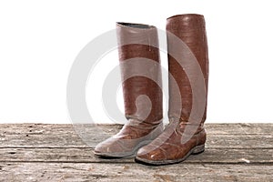 Women`s retro fashion boots. Ladies vintage leather tradional shoes. Isolated on a white background.