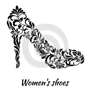 Women`s shoe from a floral ornament a white background