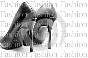 Women`s shoes in black with a red sole on a white background. Shoes for the holiday, office shoes. High-heeled shoes, stilettos.