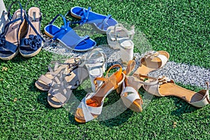 Women`s shoes on a grass photo