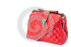 Women`s stylish fashion accessories isolated on white background. Red leather women handbag isolated on white background.