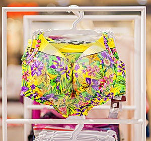 Women`s swimsuits for sale at a seaside shop. Advertise, Sale, Fashion concept