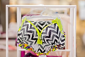 Women`s swimsuits for sale at a seaside shop. Advertise, Sale, Fashion concept