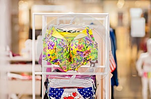 Women`s swimsuits for sale at a seaside shop. Advertise, Sale, Fashion concept