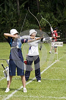 Women's Team Archery Action