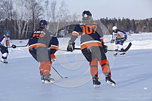 Women`s teams compete in a Pond Hockey Festival in Rangeley.