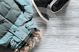 Women`s warm winter clothing and shoes - jacket and black leathe