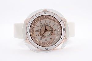 Women`s watches with diamonds on a white background