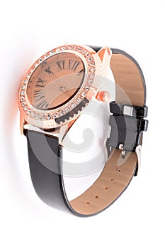 Women`s wristwatch on white background