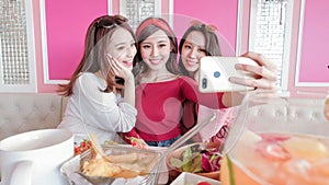 Women selfie in restaurant