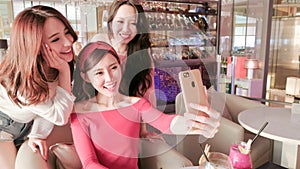 Women selfie in restaurant