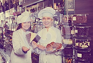 Women selling fine chocolates