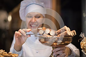 Women selling tarts and sweet pastry