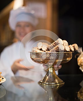 Women selling tarts and sweet pastry